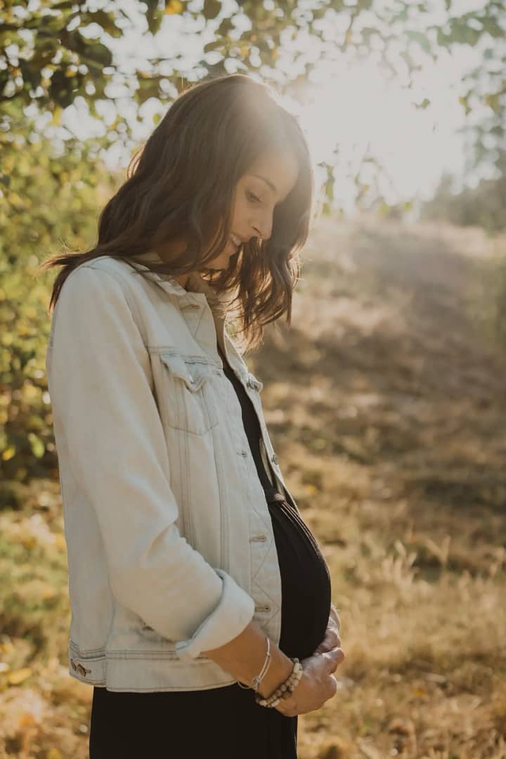 Pregnant mom in a field